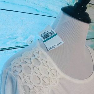 Beautiful Cream tunic in a Large.